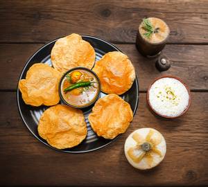 5 puri sabzi + sweet lassi