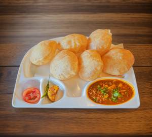 Aloo sabji with 8 poori & achar