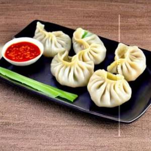 Paneer achari steamed momos