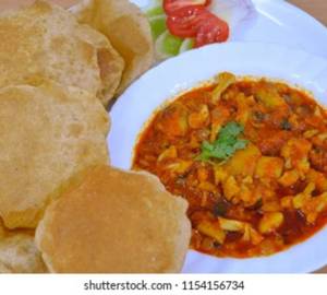 Aloo ghobhi+5 poori+raita