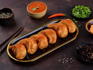 Veg Fried Momos [ 6 Pcs ]