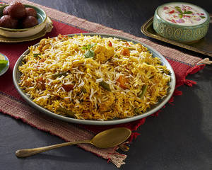 Veg Dum Biryani With Raita