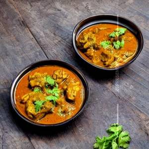 Achayan chicken curry half
