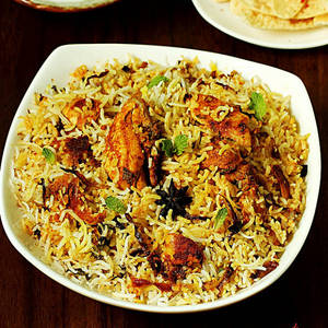 Chicken Biryani With Egg Juice Raita
