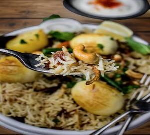 Egg Pulao[2Pieces] With Chicken Rezala [2Pieces] Combo