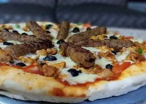 Blackpepper chicken pizza