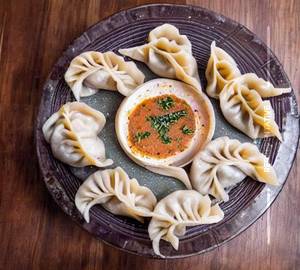Cheesy chicken momo