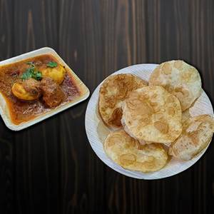 Egg Curry [2 Eggs] with 6 Luchi