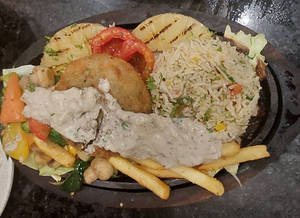 Veg  Patty Sizzler In Mushroom Sauce