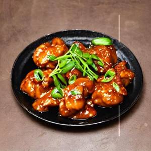 Chicken In Spicy Soya Garlic Sauce
