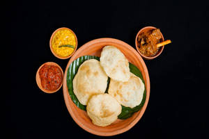Luchi With Mutton Kosha And Chana Daal