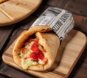 Authentic malai boti shawarma with tahini, pickle