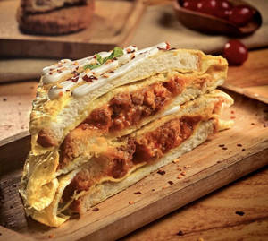 Schezwan Chicken Bread Omelette