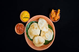 Luchi With Chicken Kosha And Chana Daal