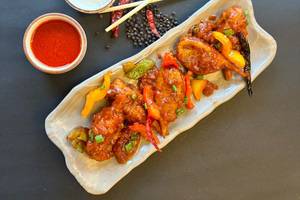 Veg Schezwan Momos[6 pcs]