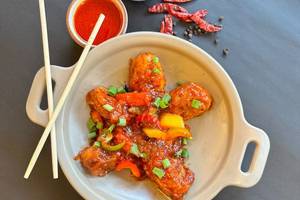 Paneer Schezwan Momos[6 pcs]