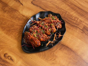 Chicken Schezwan Sauce Pan Fried Momos