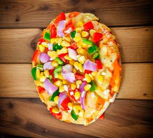 Cheesy sweet corn pizza