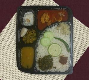 Thali with home style chicken curry
