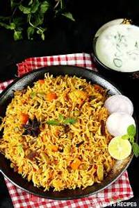Veg Biryani + Raita + Papad + Chaas