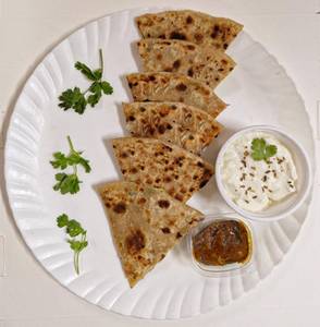 Bombastic 2 aloo paratha with jeera curd and pickle