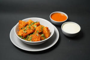 Butter Tossed Pody Idli