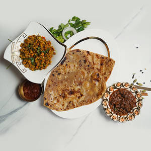 Tawa Paratha With Egg Bhurji And Dal Makhani