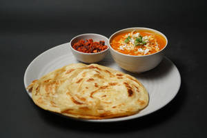 Malabar Paratha With Vegetable Korma And Poiyal