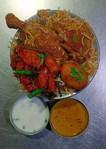 Spl Chicken Biryani ( 2 Dum Pieces , Chicken 65 6 Pieces 1 Egg )