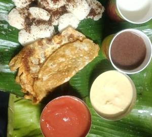 Button Idle With Ghee Karampodi (18 Pieces, One Rupee Coin Size) + Raagi Jaava + Milk + Omlette