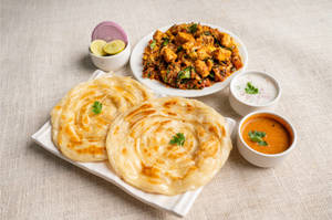Kerala Parotta [2 Pieces] With Chicken Egg Chutney