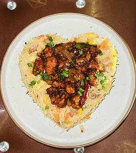 Schezwan Chicken Flamed Rice
