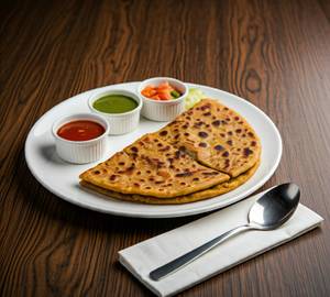 Paratha (2 Pcs) - Served With Fresh Curd, Tangy Pickle, Tomato Sauce, Flavourful Chutney & Salad.