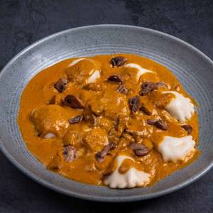 Ravioli In Creamy Tomato Pesto Sauce