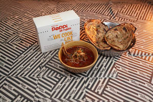 Mutton Rogan Josh (2pcs) + 2 Baby Lacha Paratha