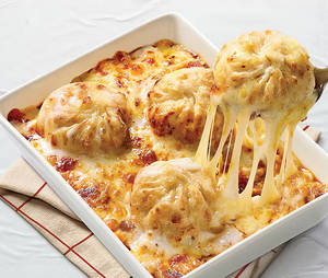 Cheesy Baked Momos [6 Pieces]
