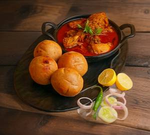 Desi Ghee With Fried Sattu Bati (4 Pieces) With Chicken Gravy (2 Pieces)