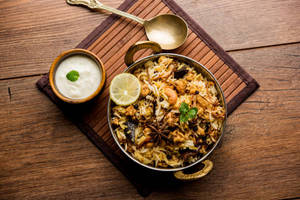 Paneer Biryani + Curd (100% Restaurant Menu Price)