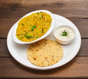 Dal Khichdi +Papad +Raitha