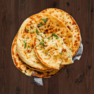 Veg Stuffed Naan With Curd