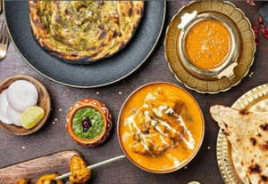 Handi Paneer + 2 Dal Makhani + 10 Butter Tandoori Roti