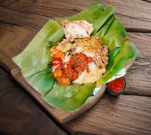 Chicken Pothichoru ( Banana Leaf)