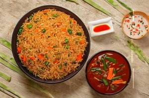 Veg Schezwan Triple Fried Rice 