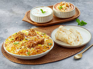 Chicken Biryani and Butter Chicken Thali