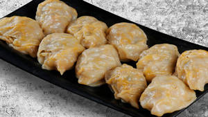 Chicken Cheese Steamed Momos