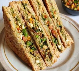 Crispy grilled paneer club sandwich