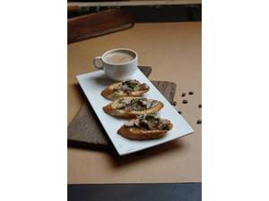 Garlic Bread Topped With Mushroom & Cheese