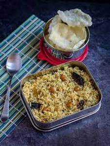 Puliyothare (Served With Poriyal And Appalam)