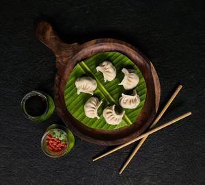 11.Chicken Cheese Steamed Momos (7 Pcs)