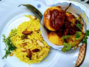 Basanti Pulao Egg Kosha Bowl Combo